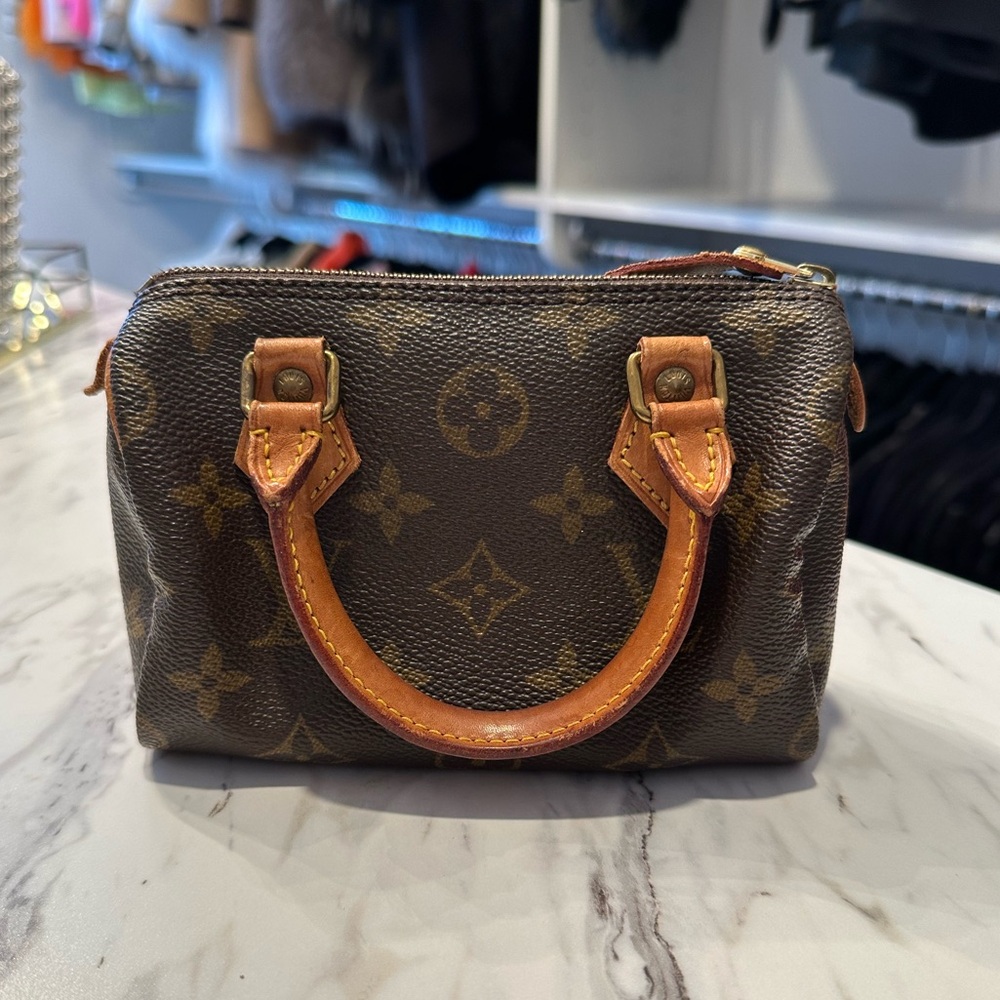 Authentic Louis Vuitton monogram mini sac HL bag